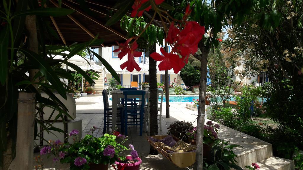 Апарт отель Paradise Garden Gumusluk Evleri Экстерьер фото
