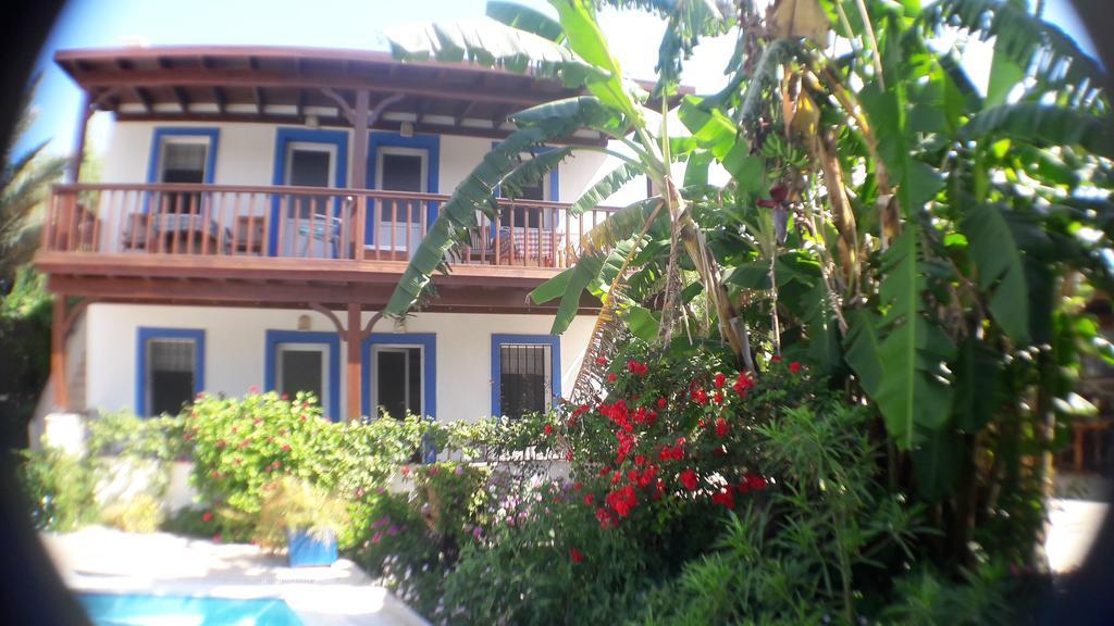 Апарт отель Paradise Garden Gumusluk Evleri Экстерьер фото